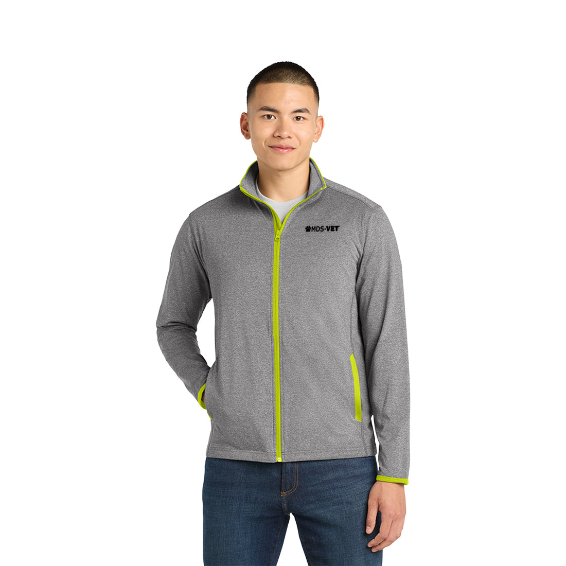 Man wearing a gray jacket with green accents on a white background