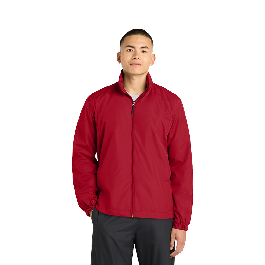 Man wearing a red jacket on a white background