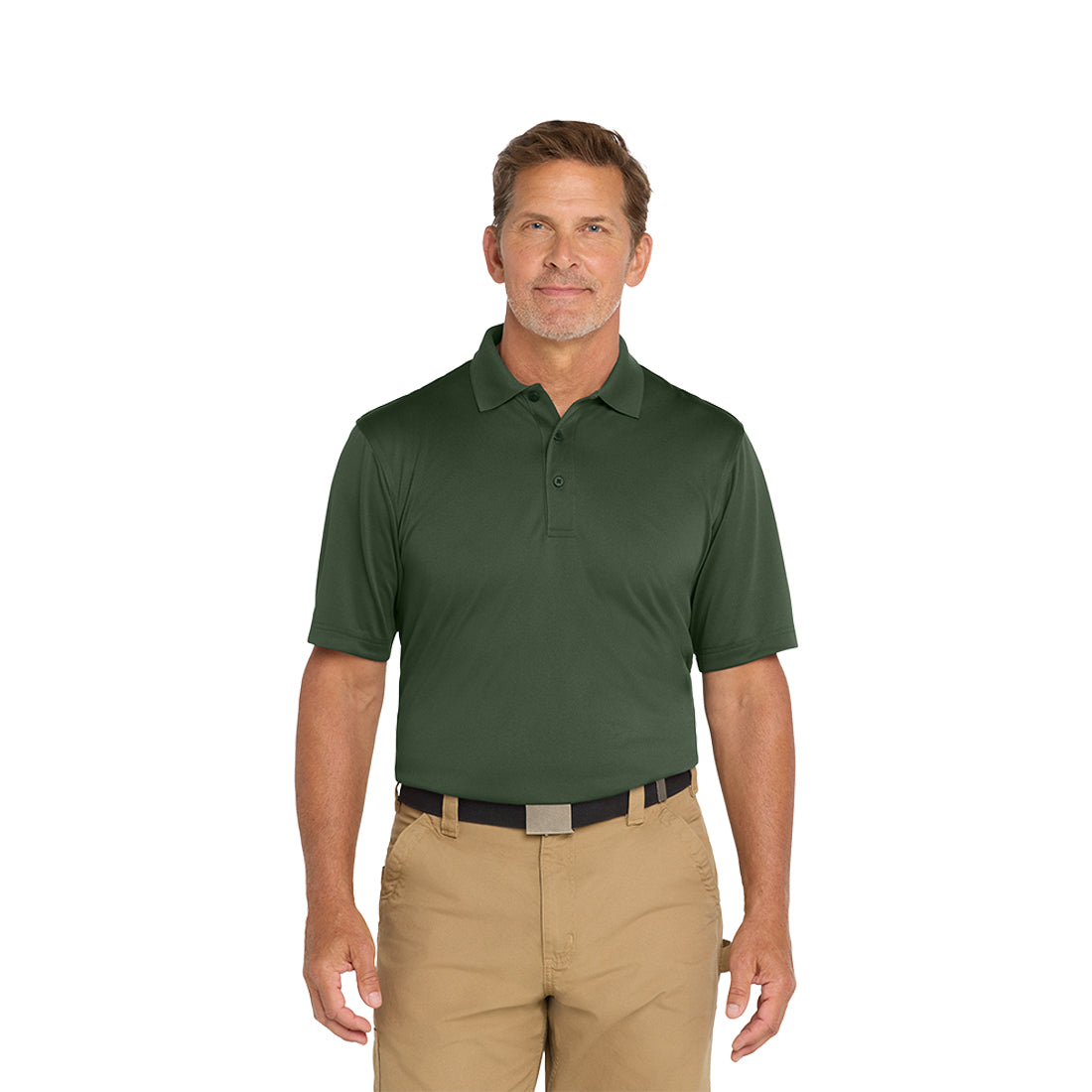 Man wearing a green polo shirt and beige pants on a white background
