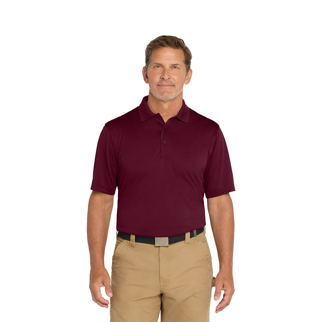 Man wearing a maroon polo shirt and beige pants on a white background
