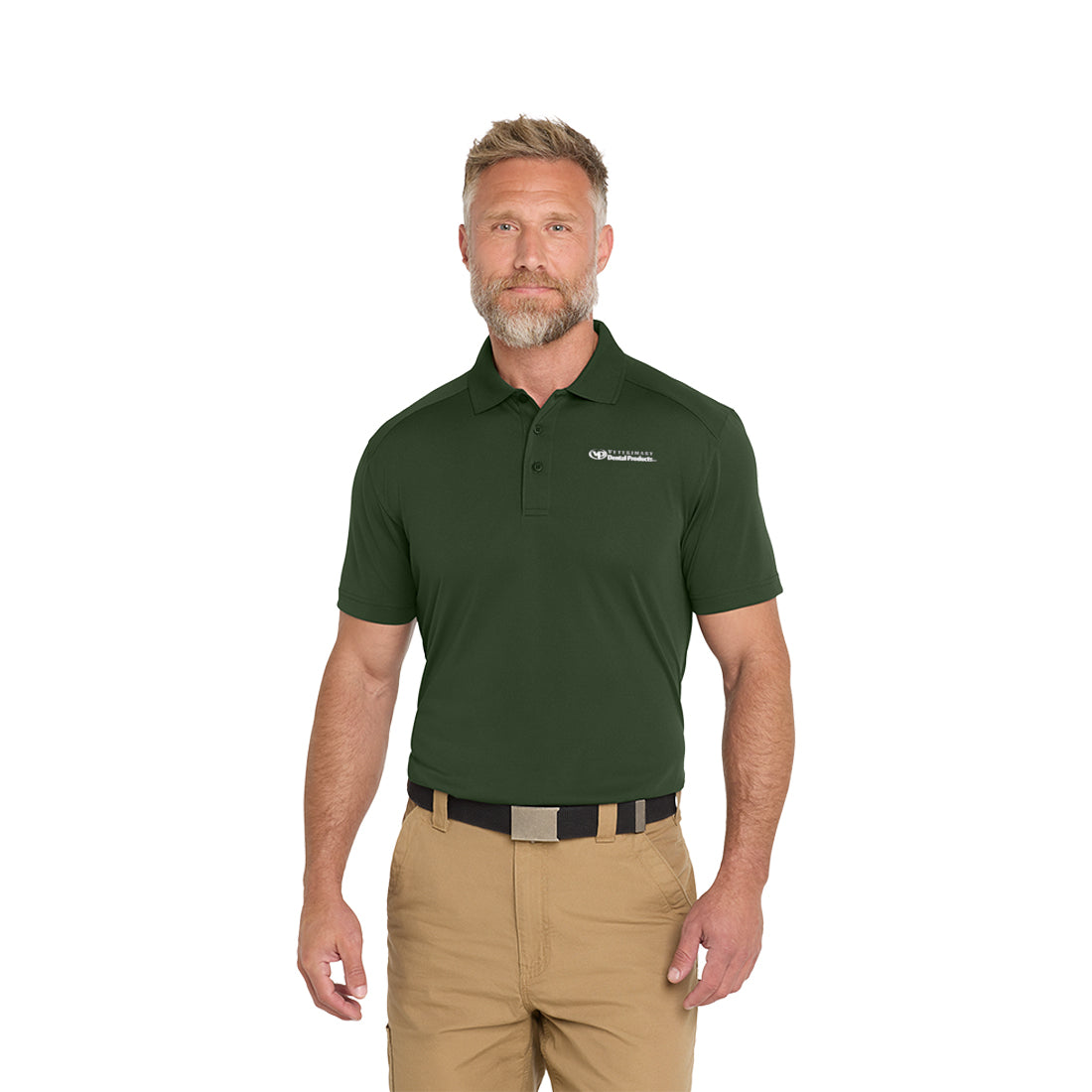 Man wearing a green polo shirt with a logo on a white background