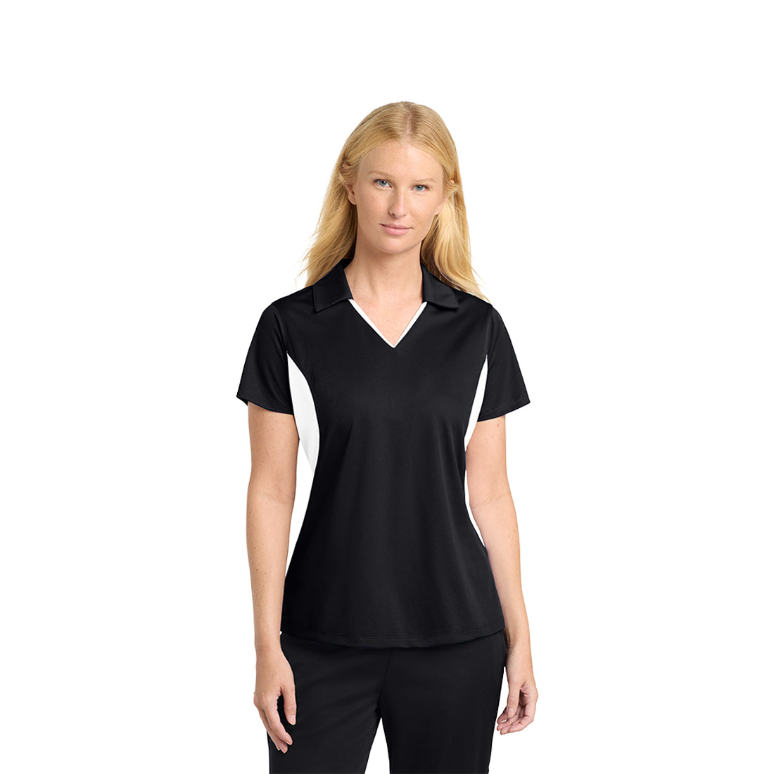 Woman wearing a black and white polo shirt on a white background