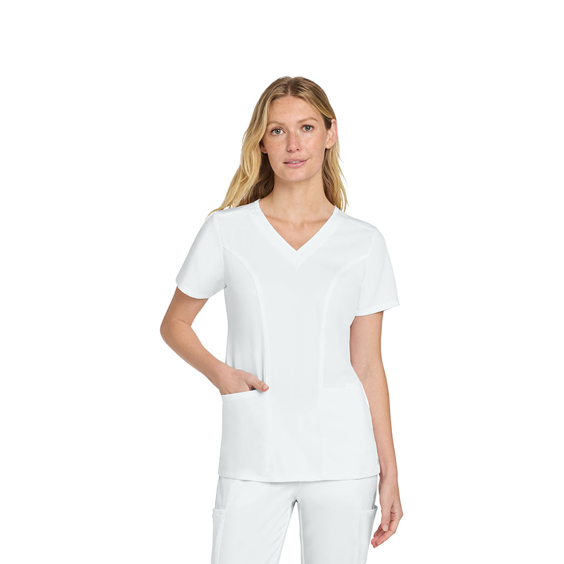 Woman wearing a white scrub top on a white background