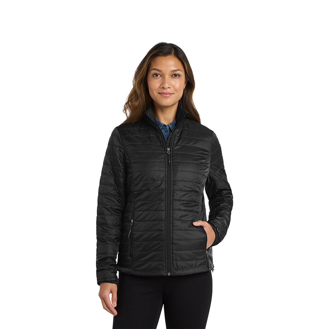 Woman wearing a black quilted jacket on a white background