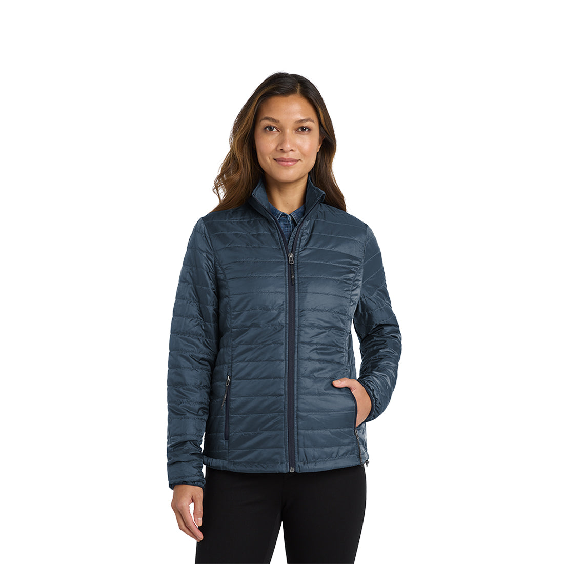 Woman wearing a blue jacket on a white background