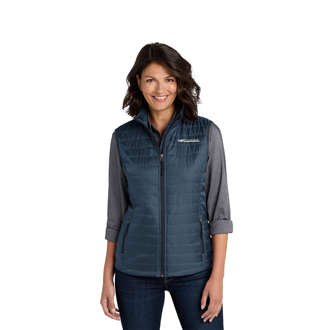 Woman wearing a blue puffer vest on a white background